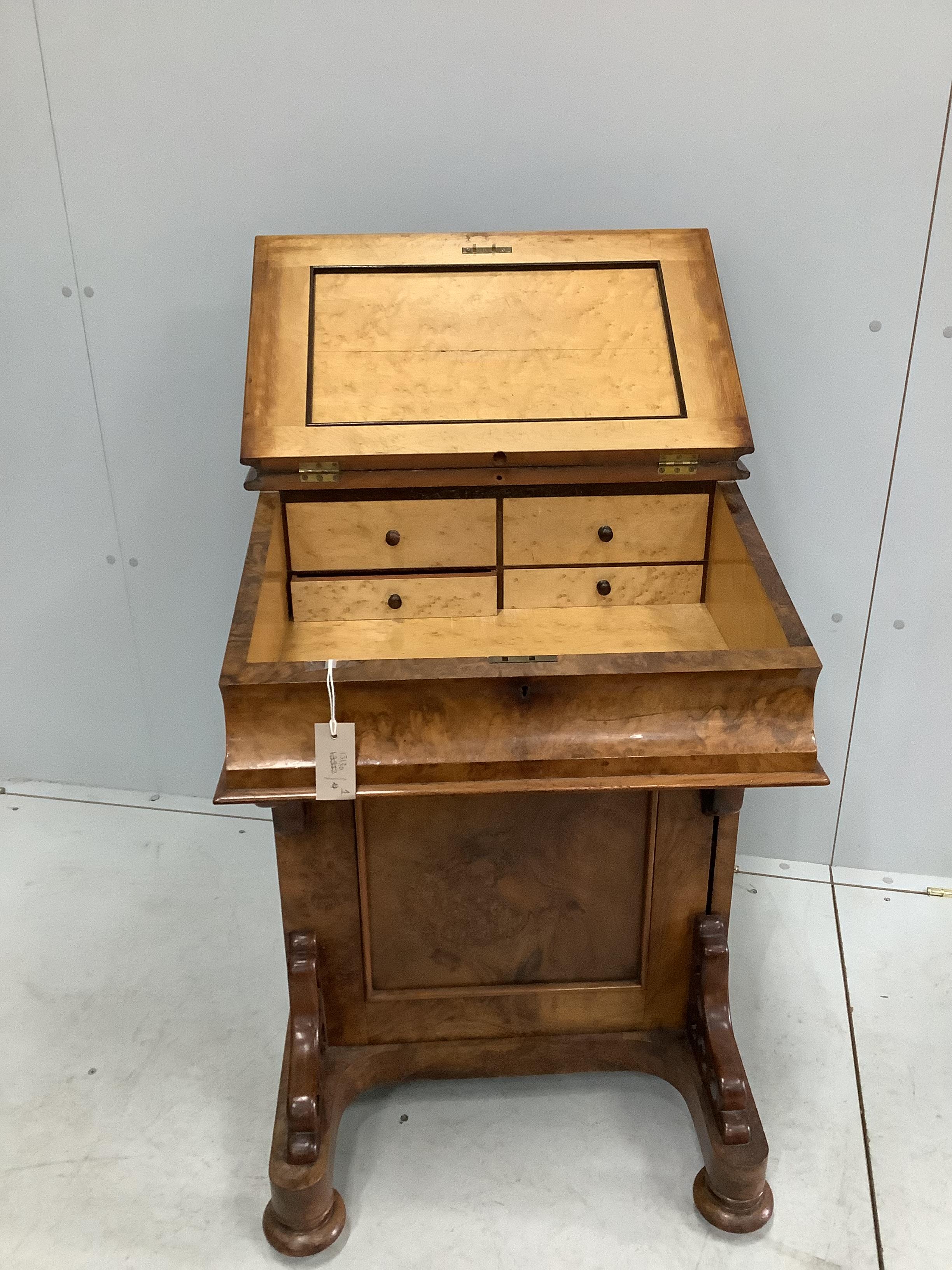 A Victorian walnut Davenport, width 57cm, depth 56cm, height 64cm